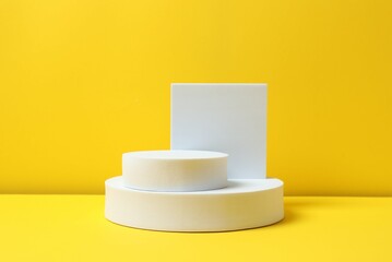 White podiums on a yellow background