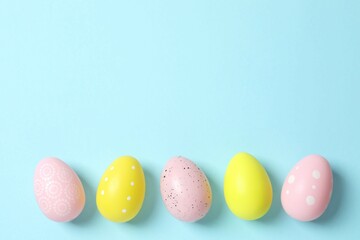 Happy Easter. Colorful eggs on color background, space for text or advertising
