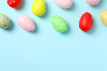 Happy Easter. Colorful eggs on color background, space for text or advertising