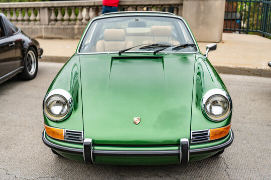 Chicago, Illinois - September 29, 2024: 1972 Porsche 911T Targa Coupe on the road. green metallic Porsche 911T Targa in Chicago.