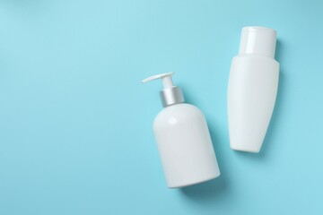 Natural cosmetic products a blue background, top view