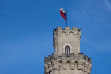 Tower of castle with flag, Hluboka nad Vltavou, Czechia