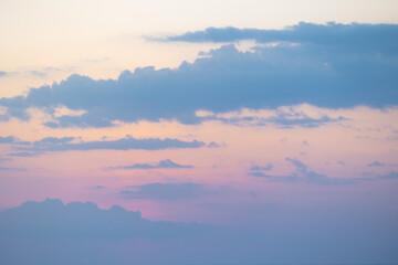 Serene pastel sunset sky with cloudy horizon over Thailand