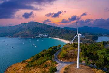 Scenic view of cape promthep with wind turbine at sunset in phuket, thailand © Parilov