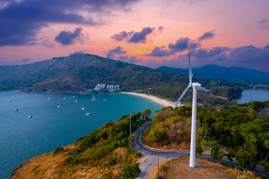 Scenic view of cape promthep with wind turbine at sunset in phuket, thailand