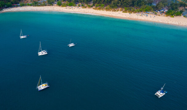 Scenic aerial view of cape promthep on phuket, thailand with sailboats and sandy beach