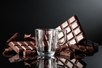Empty glass mug prepared for making hot chocolate.