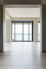 Modern interior design featuring large windows with a view of the ocean