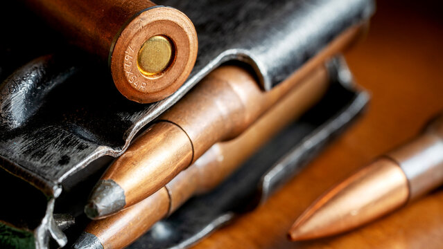 Kalashnikov assault rifle on a wooden background