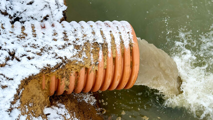 Discharge of dirty water from a downpipe