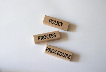 Policy Process Procedure symbol. Concept words Policy Process Procedure on wooden blocks. Beautiful white background. Business concept and Policy Process Procedure. Copy space.
