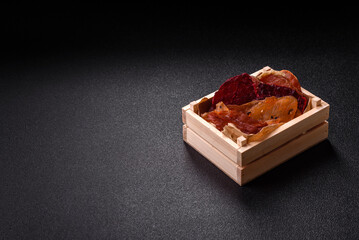 Jerky, dried meat in the form of slices with salt, spices and herbs