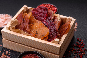 Jerky, dried meat in the form of slices with salt, spices and herbs
