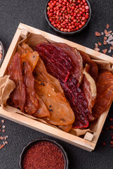 Jerky, dried meat in the form of slices with salt, spices and herbs