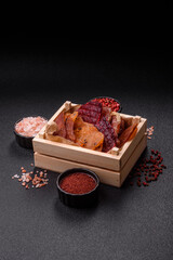 Jerky, dried meat in the form of slices with salt, spices and herbs