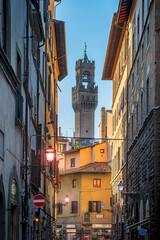View on Palazzo Vecchio tower from Via dei Neri at the old town of Florence, Tuscany, Italy