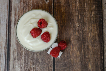 Greek yogurt with raspberries and coffee, healthy breakfast