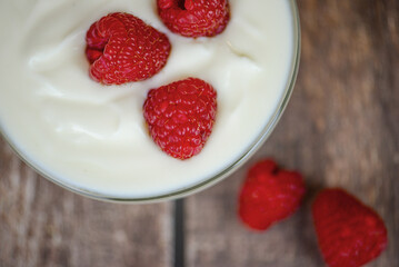 Greek yogurt with raspberries and coffee, healthy breakfast