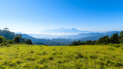 Fototapeta premium Panoramic View Of Mountain Landscape With Green Fields And Blue Sky