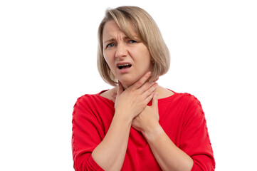 A concerned woman in a red shirt holding her throat, showing signs of discomfort against a white...