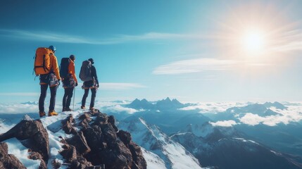Mountaineers reaching mountain top admiring scenic view