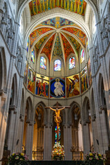Obraz premium Almudena Cathedral in Madrid, a stunning blend of neoclassical, Gothic, and Romanesque styles. A sacred landmark with breathtaking interiors, a grand dome, and a rich royal history.