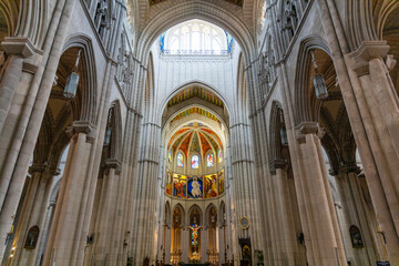 Almudena Cathedral in Madrid, a stunning blend of neoclassical, Gothic, and Romanesque styles. A sacred landmark with breathtaking interiors, a grand dome, and a rich royal history.