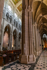 Fototapeta premium Almudena Cathedral in Madrid, a stunning blend of neoclassical, Gothic, and Romanesque styles. A sacred landmark with breathtaking interiors, a grand dome, and a rich royal history.