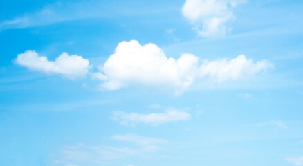 Blue sky pastel with white cloud. Cumulus clouds. Cloudscape blur background. Beautiful sky in the morning. Freedom of life, New life beginning and Positive thought and energy concepts.