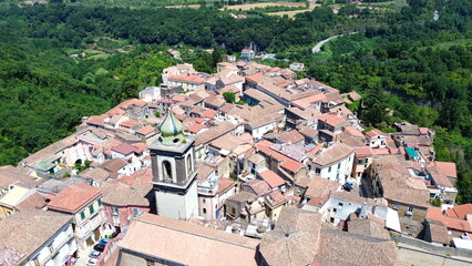 Aerial view of Sant'Agata dei Goti city in South Italy surrounded of Mountains and gree vegetation on Summer light
