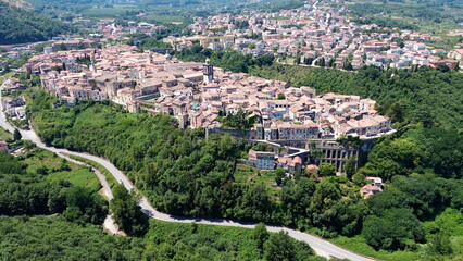 Aerial view of Sant'Agata dei Goti city in South Italy surrounded of Mountains and gree vegetation on Summer light