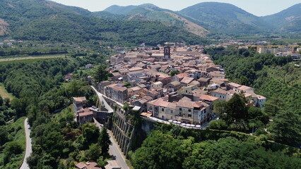 Aerial view of Sant'Agata dei Goti city in South Italy surrounded of Mountains and gree vegetation on Summer light