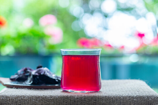 A  glass of purple basil cold drink called reyhan şerbeti, a traditional Turkish beverage
