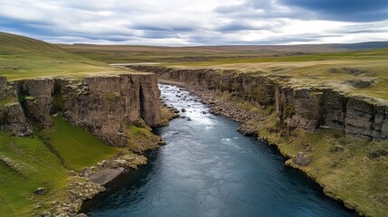 Obraz premium Majestic river canyon adventure iceland aerial view natural landscape scenic beauty