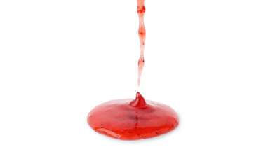Pouring delicious strawberry sauce on white background, closeup