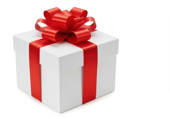 Fototapeta premium A white gift box wrapped with a red satin ribbon and bow isolated on a white background