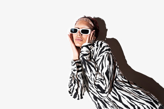 Fashion Model Posing in Animal Print with Sunglasses