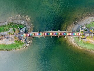 Colorful train tracks span a waterway. A vibrant, artistic bridge. West Bay Drive, Olympia,...