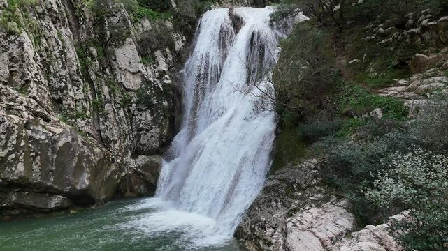 Aerial view of Polylimnio Waterfall in Messinia, Greece after heavy rainfall