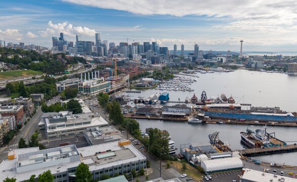 Aerial view of Seattle's waterfront, featuring the city skyline, harbor, and various vessels. Urban development meets maritime activity. Lake Union, Seattle, Washington, USA