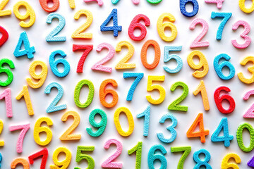 Colorful numbers scattered on white background.