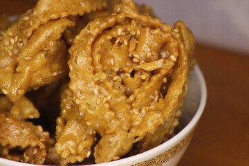 A close-up of sweet moroccan cookie known as Chebakia