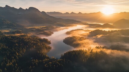 Naklejka premium Breathtaking sunrise over misty river valley mountain landscape aerial photography nature tranquil view