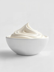 Creamy mixture in a white bowl ready for culinary use in a kitchen setting