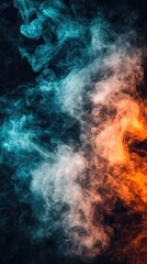 Fototapeta premium Abstract swirling blue and orange smoke against black background; design element