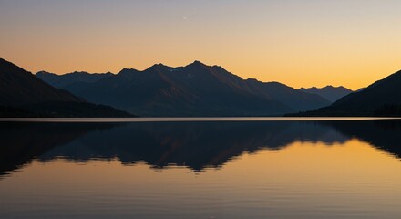 Fototapeta premium Majestic mountains reflecting on a serene lake during twilight hour creating a tranquil and peaceful atmosphere