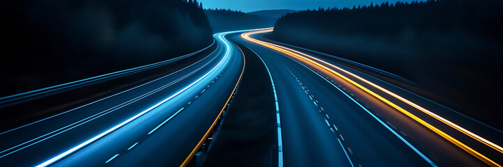 A long, curving road with many cars on it