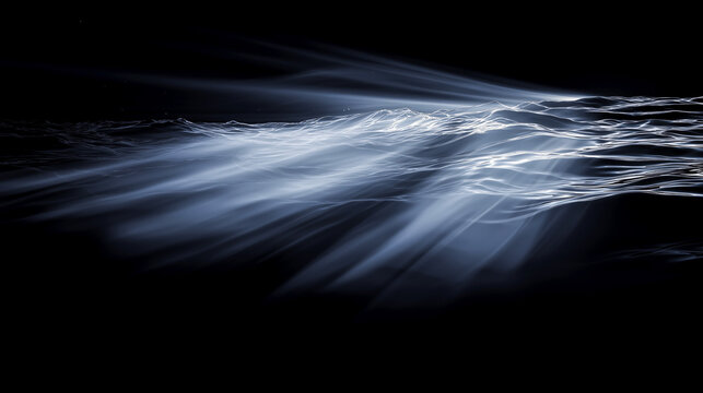 Waves bathed in light, where ocean and sky meet in ethereal harmony, captured with elegant simplicity and a striking contrast.