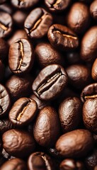 Naklejka premium Up close macro view of dark roasted coffee beans