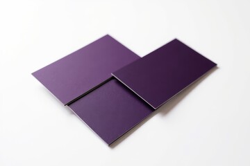 Elegant purple business cards on a white surface